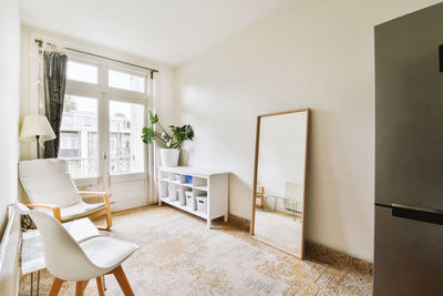 Empty chairs and table at home