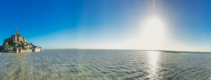Panoramic view of sea against clear sky