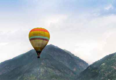 Low angle view of hot air balloon against sky