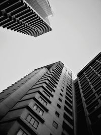 Low angle view of modern buildings against sky