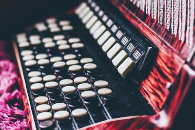 Close-up of accordion on table