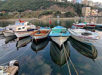 Boats moored in harbor