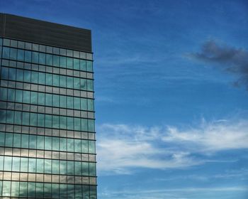 Low angle view of modern building against sky