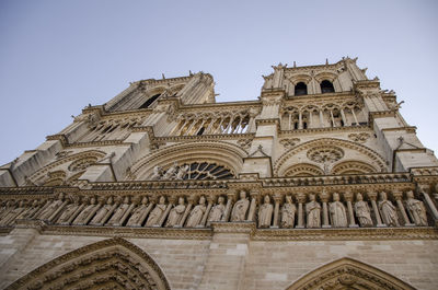 Low angle view of ornate building against clear sky