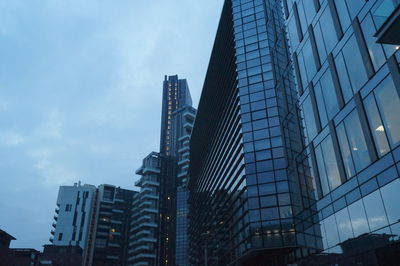 Low angle view of skyscrapers against sky