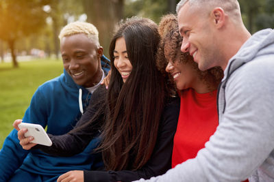 Group of people on mobile phone