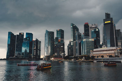 View of modern buildings in city against sky