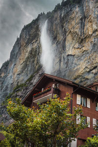 Lauterbrunnen valley, switzerland. swiss alps. small house in mountains, waterfall. forest and rocks