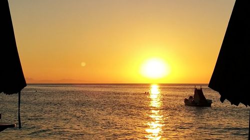 Scenic view of sea during sunset