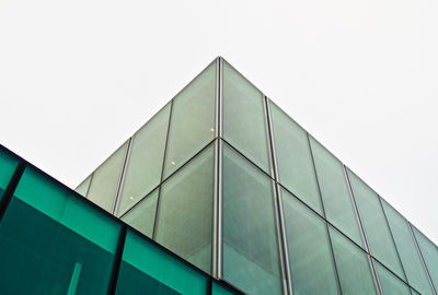 Low angle view of modern building against clear sky