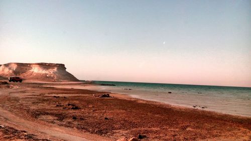 Scenic view of beach against sky