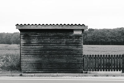 Built structure on field against clear sky