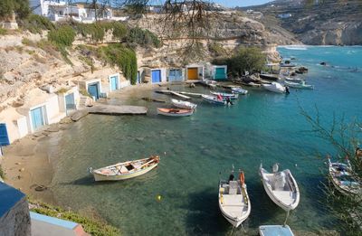 High angle view of boats moored at harbor