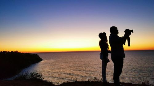 Scenic view of sea at sunset