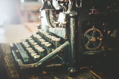 Close-up of old typewriter on table