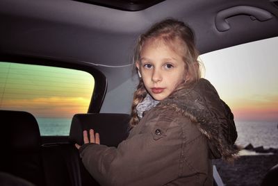 Portrait of woman in car