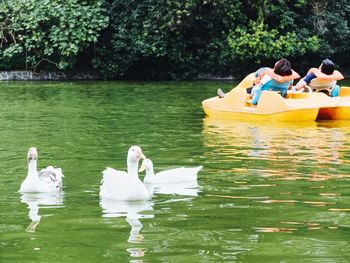 People relaxing in water