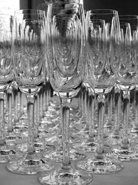 Close-up of wine glasses on table