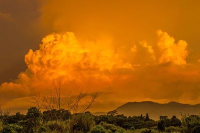 Scenic view of dramatic sky during sunset