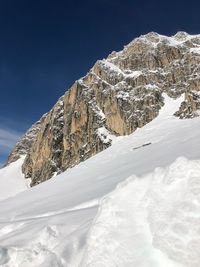 Snowcapped mountains against clear sky