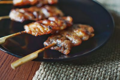 High angle view of meat in plate on table