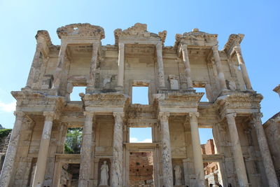 Low angle view of old temple against clear sky