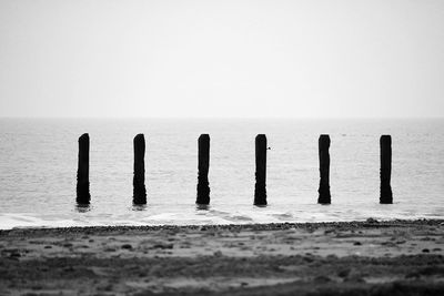 View of beach against clear sky