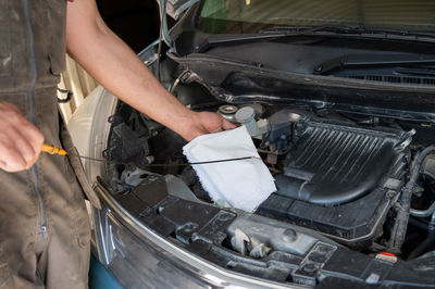 Man working in car