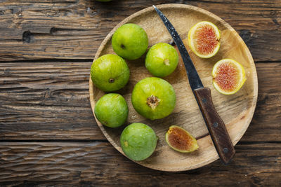 High angle view of fruits on cutting board