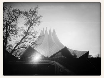 Digital composite image of building against sky