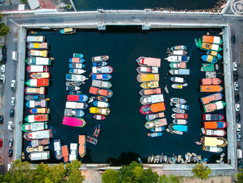 Directly above shot of colorful boats moored in pond