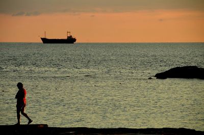 Scenic view of sea at sunset