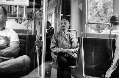 Friends sitting in train