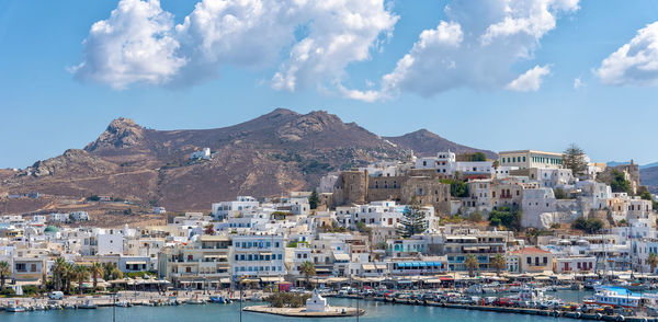 Panoramic view of townscape by sea against sky