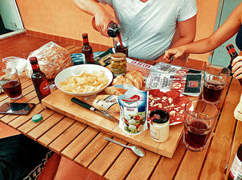 High angle view of people served on table