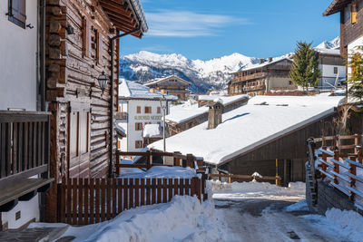 Winter magic. the ancient wooden houses of sauris di sopra. italy