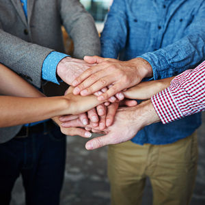 Midsection of man holding hands