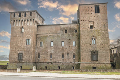 The beautiful facade of the castle of san giorgio in mantua at sunset