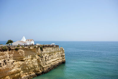 Scenic view of sea against clear sky