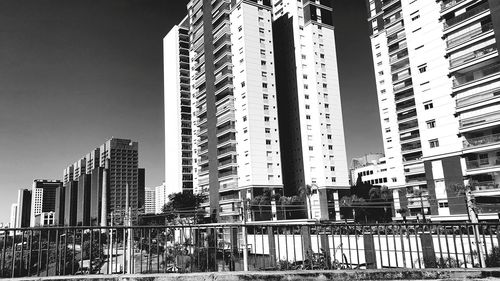 Low angle view of buildings against sky in city