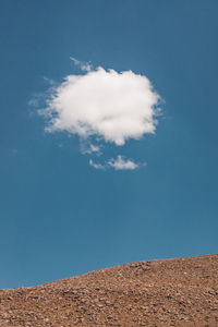 Low angle view of land against sky