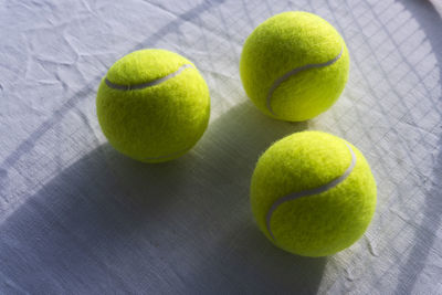 Close-up of green tennis balls