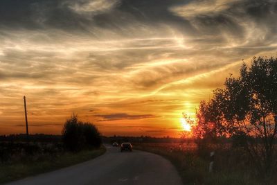 View of road against cloudy sky