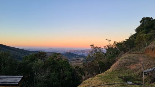 Scenic view of landscape against sky during sunset