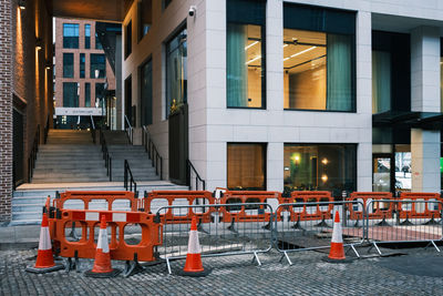 Empty chairs on street