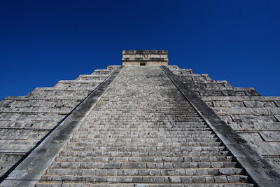 Low angle view of historical aztec piramid against sky