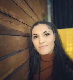 Portrait of smiling young woman outdoors