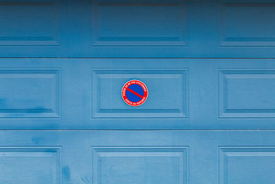 Information sign on blue door