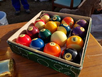 High angle view of multi colored balls on table