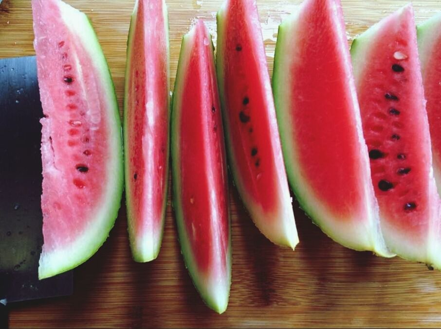 food and drink, food, indoors, freshness, still life, healthy eating, table, close-up, red, slice, vegetable, wood - material, variation, multi colored, wooden, group of objects, fruit, in a row, no people, high angle view